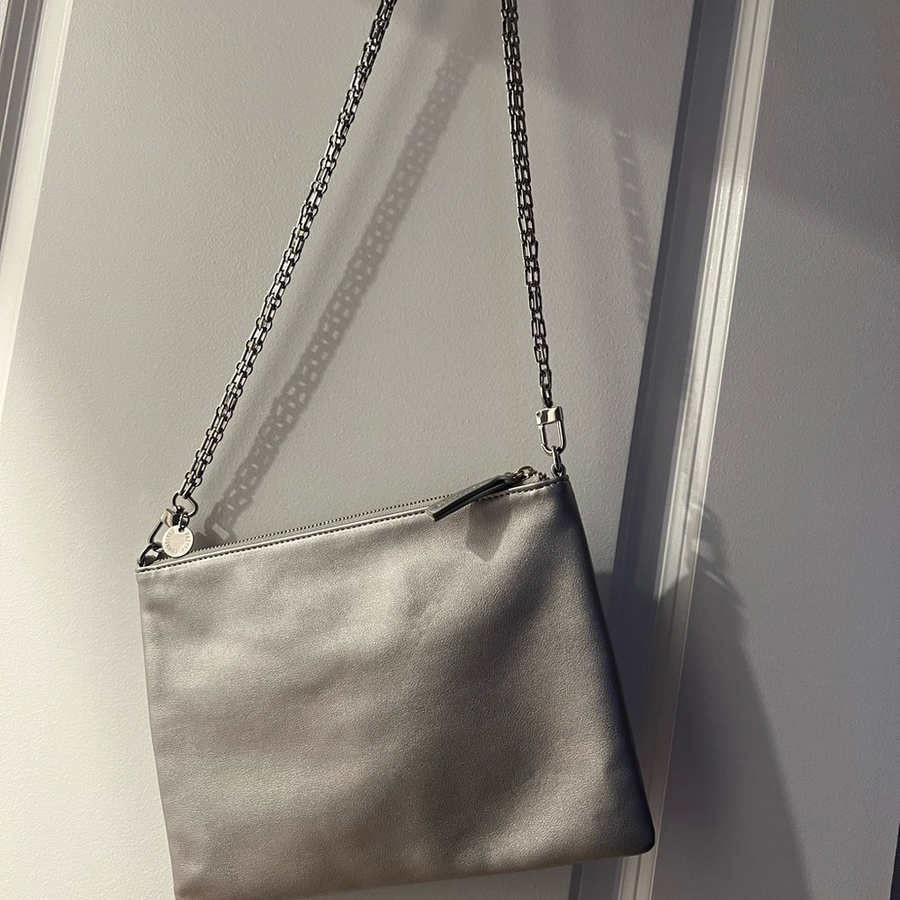 Pretty Connected SILVER makeup BAG AND CAMERA CHAIN
New